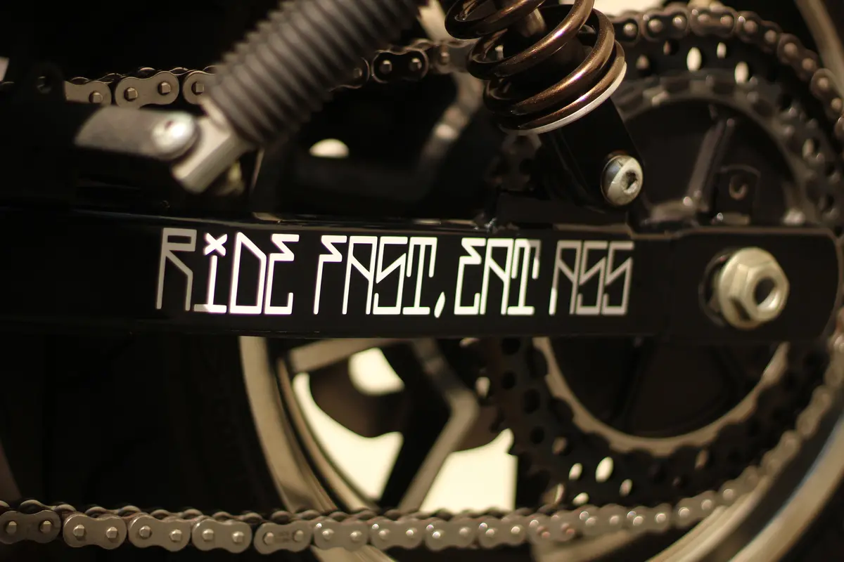 Ride Fast, Eat Ass Swing Arm Sticker 1